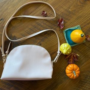 Pink half circle crossbody purse